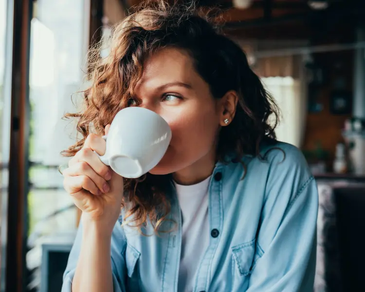 She drinks coffee